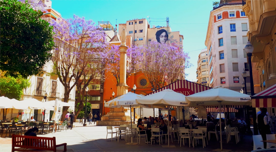 A beautiful city square with outdoor cafes.